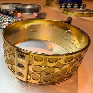 Authentic Coach wide bangle bracelet featuring bold multicolor enamel stripes fr